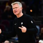 Cleveland, Ohio, USA; Golden State Warriors head coach Steve Kerr reacts against the Cleveland Cavaliers during the second half at Rocket Arena. Mandatory Credit: Ken Blaze-Imagn Images