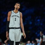 Las Vegas, Nevada, USA; San Antonio Spurs forward Victor Wembanyama (1) stands on the court against the Oklahoma City Thunder during the second quarter at T-Mobile Arena. Mandatory Credit: Kirby Lee-Imagn Images