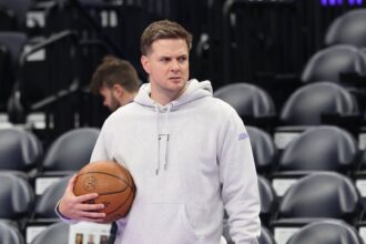 Salt Lake City, Utah, USA; Utah Jazz head coach Will Hardy watches the teams warm up before the game against the Oklahoma City Thunder at Delta Center. Mandatory Credit: Rob Gray-Imagn Images
