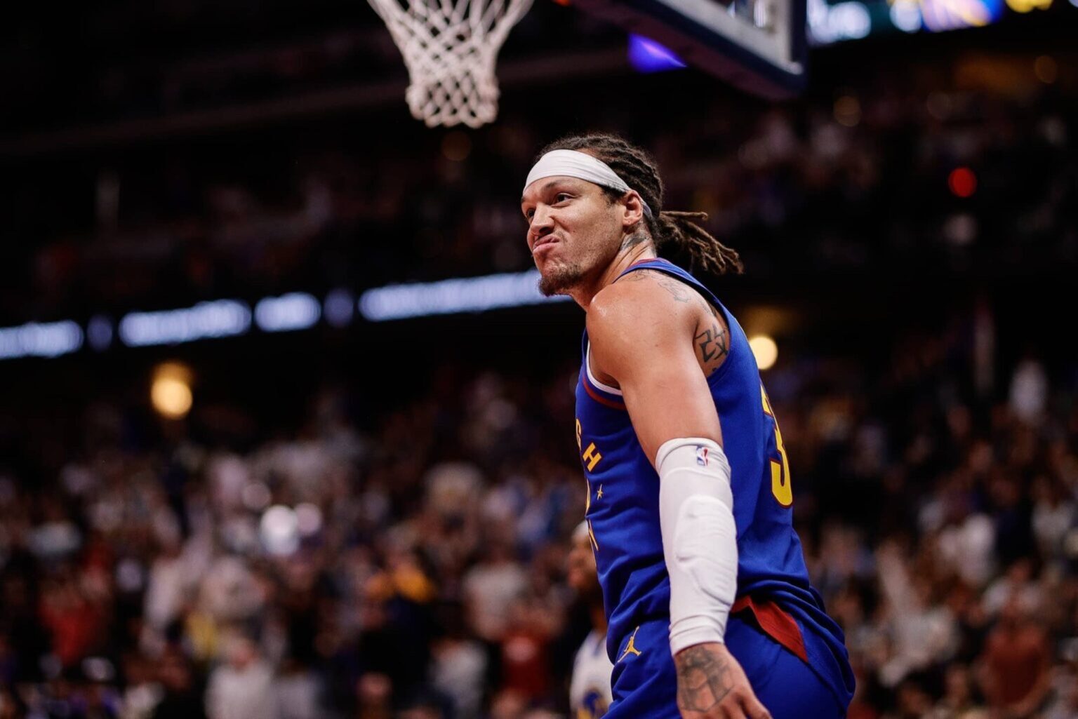 Nov 7, 2025; Denver, Colorado, USA; Denver Nuggets forward Aaron Gordon (32) reacts after a play in the third quarter against the Golden State Warriors at Ball Arena. Mandatory Credit: Isaiah J. Downing-Imagn Images