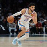 Jan 17, 2026; Miami, Florida, USA; Oklahoma City Thunder guard Ajay Mitchell (25) dribbles the basketball against the Miami Heat during the first quarter at Kaseya Center. Mandatory Credit: Sam Navarro-Imagn Images
