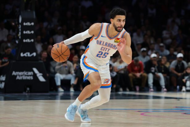 Jan 17, 2026; Miami, Florida, USA; Oklahoma City Thunder guard Ajay Mitchell (25) dribbles the basketball against the Miami Heat during the first quarter at Kaseya Center. Mandatory Credit: Sam Navarro-Imagn Images