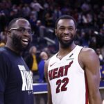 Jan 19, 2026; San Francisco, California, USA; Golden State Warriors forward Draymond Green (23) smiles with Miami Heat forward Andrew Wiggins (22) after the game at Chase Center. Mandatory Credit: Kelley L Cox-Imagn Images
