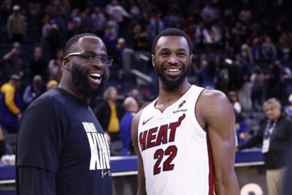 Jan 19, 2026; San Francisco, California, USA; Golden State Warriors forward Draymond Green (23) smiles with Miami Heat forward Andrew Wiggins (22) after the game at Chase Center. Mandatory Credit: Kelley L Cox-Imagn Images