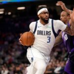 Dallas Mavericks forward Anthony Davis (3) drives past Sacramento Kings guard DeMar DeRozan (10) in the first quarter at the Golden 1 Center.