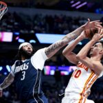 Apr 2, 2025; Dallas, Texas, USA; Dallas Mavericks forward Anthony Davis (3) defends the shot of Atlanta Hawks forward Zaccharie Risacher (10)) during the third quarter at American Airlines Center. Mandatory Credit: Kevin Jairaj-Imagn Images