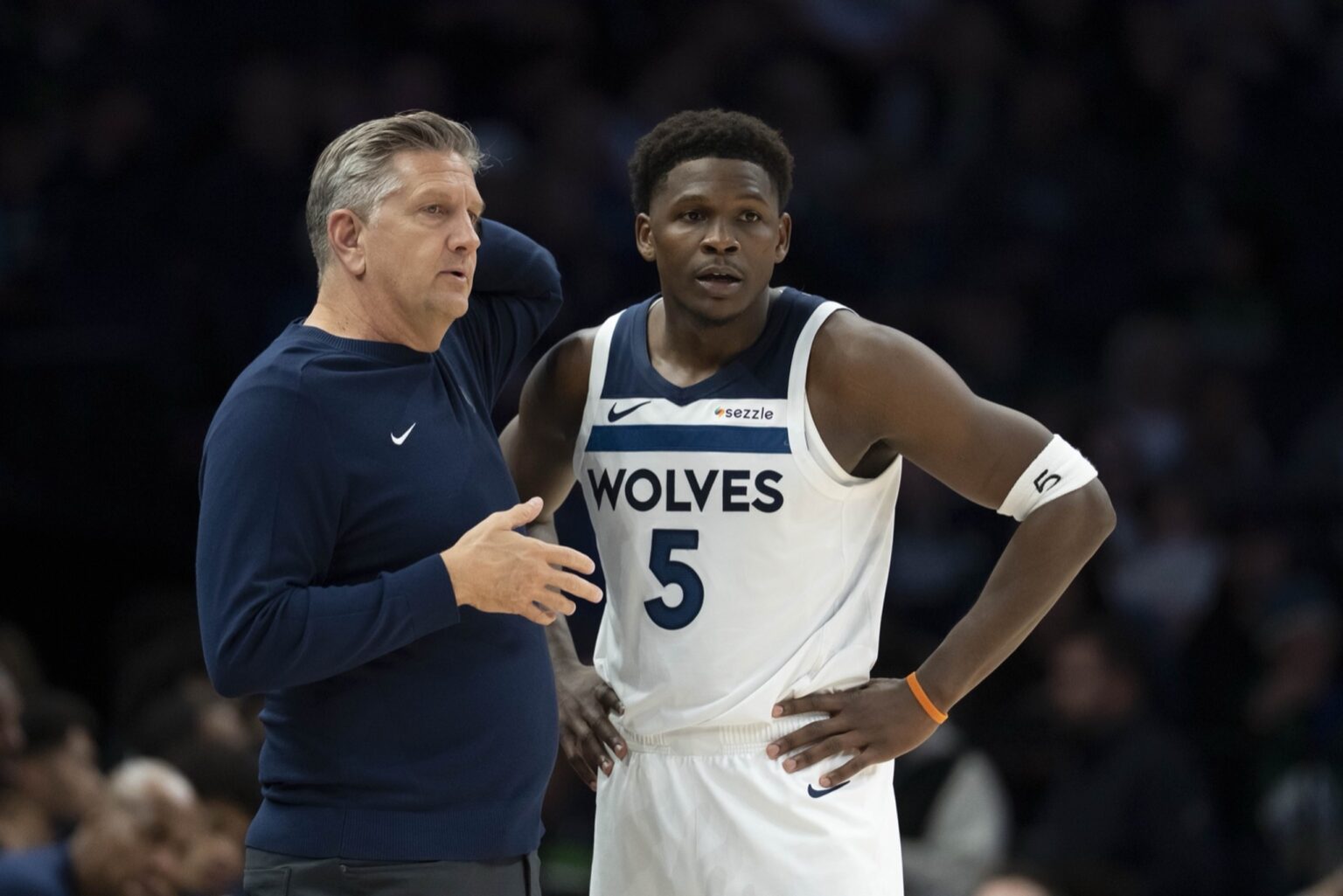 Nov 17, 2025; Minneapolis, Minnesota, USA; Minnesota Timberwolves head coach Chris Finch and Minnesota Timberwolves guard Anthony Edwards (5) looks on against the Dallas Mavericks in the second half at Target Center. Mandatory Credit: Jesse Johnson-Imagn Images