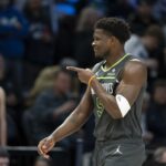 Jan 11, 2026; Minneapolis, Minnesota, USA; Minnesota Timberwolves guard Anthony Edwards (5) points to the San Antonio Spurs bench in the first half at Target Center. Mandatory Credit: Jesse Johnson-Imagn Images