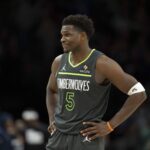 Jan 11, 2026; Minneapolis, Minnesota, USA; Minnesota Timberwolves guard Anthony Edwards (5) looks on against the San Antonio Spurs in the second half at Target Center. Mandatory Credit: Jesse Johnson-Imagn Images