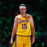 Los Angeles Lakers guard Austin Reaves (15) against the Phoenix Suns at Mortgage Matchup Center.