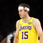 Los Angeles Lakers guard Austin Reaves (15) against the Phoenix Suns at Mortgage Matchup Center.