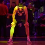 Dec 10, 2025; Los Angeles, California, USA; Los Angeles Lakers guard Austin Reaves (15) waits on the court during a time out in the second half against the San Antonio Spurs at Crypto.com Arena. Mandatory Credit: Jayne Kamin-Oncea-Imagn Images