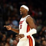 Jan 25, 2026; Phoenix, Arizona, USA; Miami Heat center Bam Adebayo (13) reacts against the Phoenix Suns in the second half at Mortgage Matchup Center. Mandatory Credit: Mark J. Rebilas-Imagn Images
