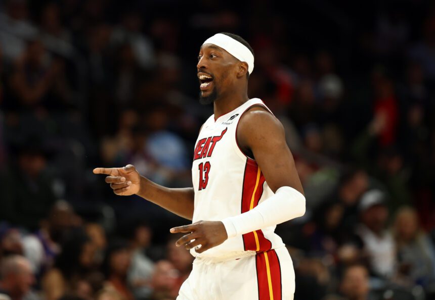 Jan 25, 2026; Phoenix, Arizona, USA; Miami Heat center Bam Adebayo (13) reacts against the Phoenix Suns in the second half at Mortgage Matchup Center. Mandatory Credit: Mark J. Rebilas-Imagn Images