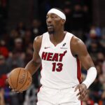Miami Heat center Bam Adebayo (13) brings the ball up court against the Chicago Bulls during the second half at United Center.
