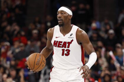 Miami Heat center Bam Adebayo (13) brings the ball up court against the Chicago Bulls during the second half at United Center.