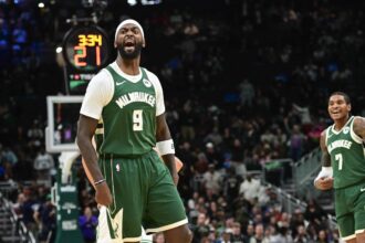 Dec 11, 2025; Milwaukee, Wisconsin, USA; Milwaukee Bucks forward Bobby Portis (9) reacts in the third quarter after scoring a basket against the Boston Celtics at Fiserv Forum. Mandatory Credit: Benny Sieu-Imagn Images