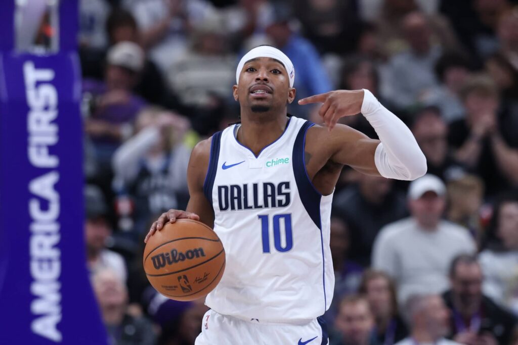 Jan 8, 2026; Salt Lake City, Utah, USA; Dallas Mavericks guard Brandon Williams (10) brings the ball up the court against the Utah Jazz during the first half at Delta Center. Mandatory Credit: Rob Gray-Imagn Images