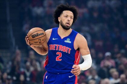 Detroit Pistons guard Cade Cunningham (2) brings the ball up court against the Cleveland Cavaliers during the first quarter at Rocket Arena.