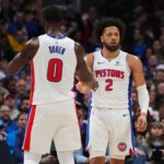 Jan 27, 2026; Denver, Colorado, USA; Detroit Pistons guard Cade Cunningham (2) and center Jalen Duren (0) react to a foul called in the first quarter against the Denver Nuggets at Ball Arena. Mandatory Credit: Ron Chenoy-Imagn Images