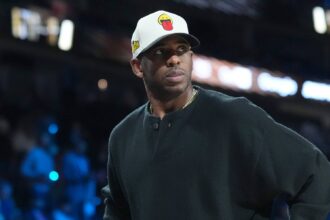 Chris Paul watches during the Emirates NBA Cup semifinals game between the San Antonio Spurs and Oklahoma City Thunder at T-Mobile Arena.