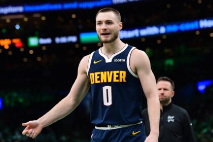 Jan 7, 2026; Boston, Massachusetts, USA; Denver Nuggets guard Christian Braun (0) reacts after a play during the second half against the Boston Celtics at TD Garden. Mandatory Credit: Bob DeChiara-Imagn Images