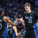 Jan 3, 2026; Dallas, Texas, USA; Dallas Mavericks guard Brandon Williams (10) celebrates with Dallas Mavericks forward Cooper Flagg (32) during the second half against the Houston Rockets at American Airlines Center. Mandatory Credit: Kevin Jairaj-Imagn Images
