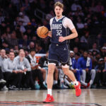 Jan 19, 2026; New York, New York, USA; Dallas Mavericks forward Cooper Flagg (32) brings the ball upcourt against the New York Knicks during the fourth quarter at Madison Square Garden. Mandatory Credit: Wendell Cruz-Imagn Images