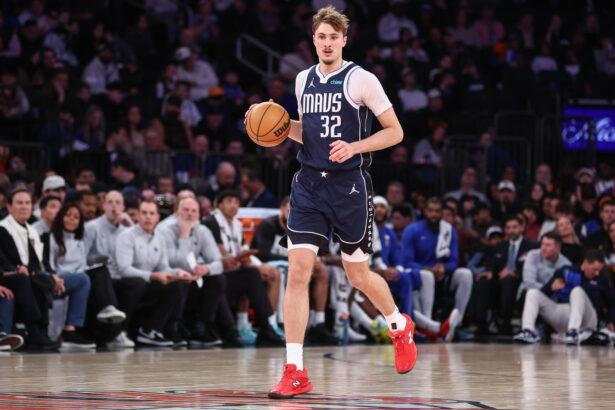 Jan 19, 2026; New York, New York, USA; Dallas Mavericks forward Cooper Flagg (32) brings the ball upcourt against the New York Knicks during the fourth quarter at Madison Square Garden. Mandatory Credit: Wendell Cruz-Imagn Images