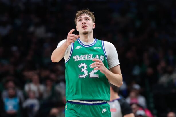 Jan 29, 2026; Dallas, Texas, USA; Dallas Mavericks forward Cooper Flagg (32) reacts during the second half against the Charlotte Hornets at American Airlines Center. Mandatory Credit: Kevin Jairaj-Imagn Images