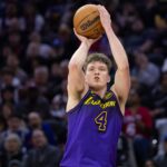 Jan 28, 2025; Philadelphia, Pennsylvania, USA; Los Angeles Lakers guard Dalton Knecht (4) shoots against the Philadelphia 76ers during the second quarter at Wells Fargo Center. Mandatory Credit: Bill Streicher-Imagn Images