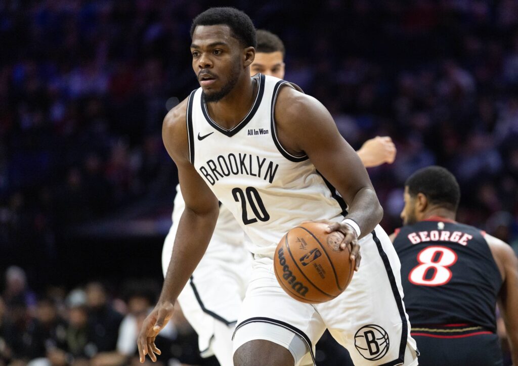 Dec 23, 2025; Philadelphia, Pennsylvania, USA; Brooklyn Nets center Day'Ron Sharpe (20) dribbles the ball against the Philadelphia 76ers during the first quarter at Xfinity Mobile Arena. Mandatory Credit: Bill Streicher-Imagn Images