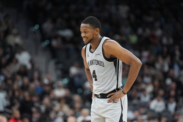 Jan 3, 2026; San Antonio, Texas, USA; San Antonio Spurs guard De'aaron Fox (4) during the second half against the Portland Trail Blazers at Frost Bank Center. Mandatory Credit: Daniel Dunn-Imagn Images