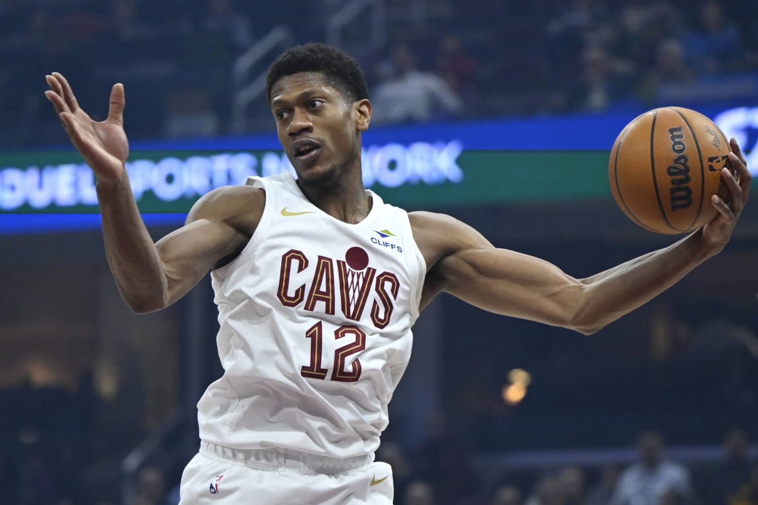 Dec 3, 2025; Cleveland, Ohio, USA; Cleveland Cavaliers forward De'Andre Hunter (12) rebounds in the first quarter against the Portland Trail Blazers at Rocket Arena. Mandatory Credit: David Richard-Imagn Images