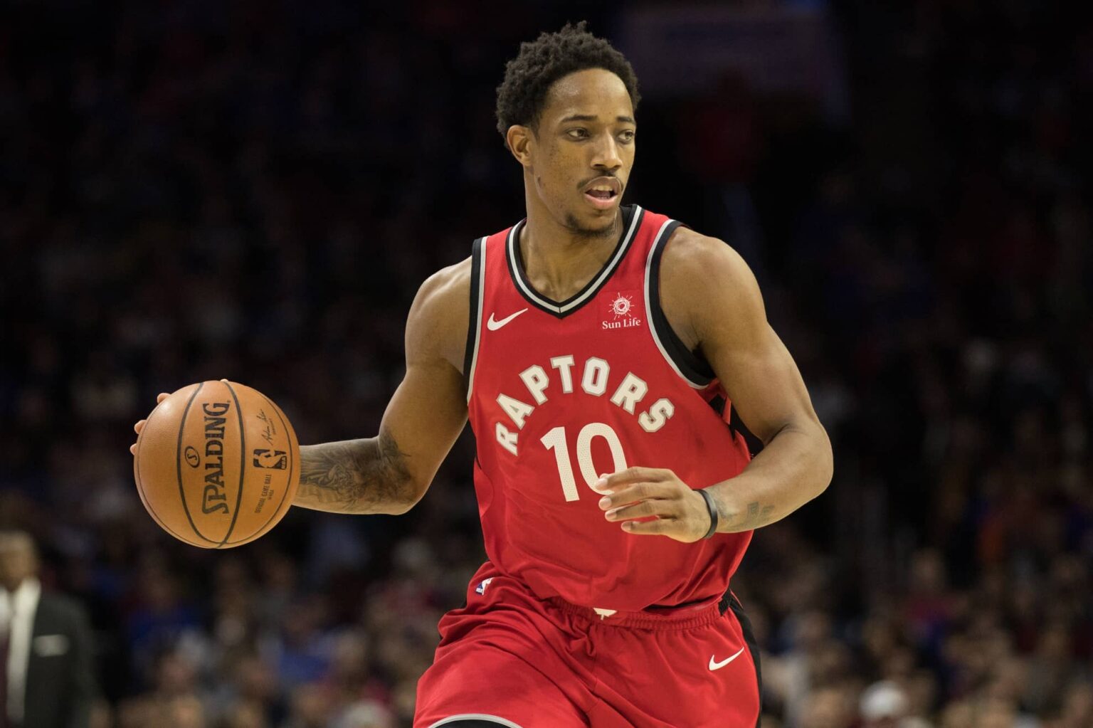 Toronto Raptors guard DeMar DeRozan (10) dribbles against the Philadelphia 76ers during the third quarter at Wells Fargo Center.