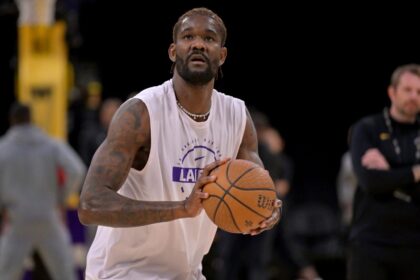 Dec 10, 2025; Los Angeles, California, USA; Los Angeles Lakers center Deandre Ayton (5) warms up prior to the game against the San Antonio Spurs at Crypto.com Arena. Mandatory Credit: Jayne Kamin-Oncea-Imagn Images