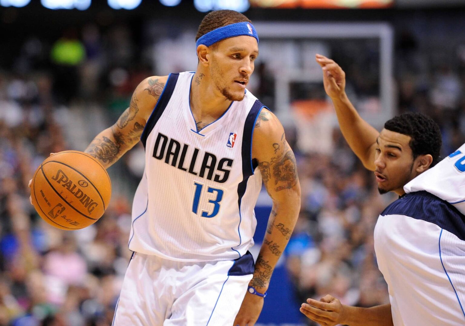 Jan 29, 2012; Dallas, TX, USA; Dallas Mavericks shooting guard Delonte West (13) brings the ball up the court against the San Antonio Spurs during the game at the American Airlines Center. The Mavericks defeated the Spurs 101-100. Mandatory Credit: Jerome Miron-Imagn Images