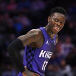 Dec 27, 2025; Sacramento, California, USA; Sacramento Kings guard Dennis Schroder (17) smiles between plays against the Dallas Mavericks during the fourth quarter at Golden 1 Center. Mandatory Credit: Kelley L Cox-Imagn Images
