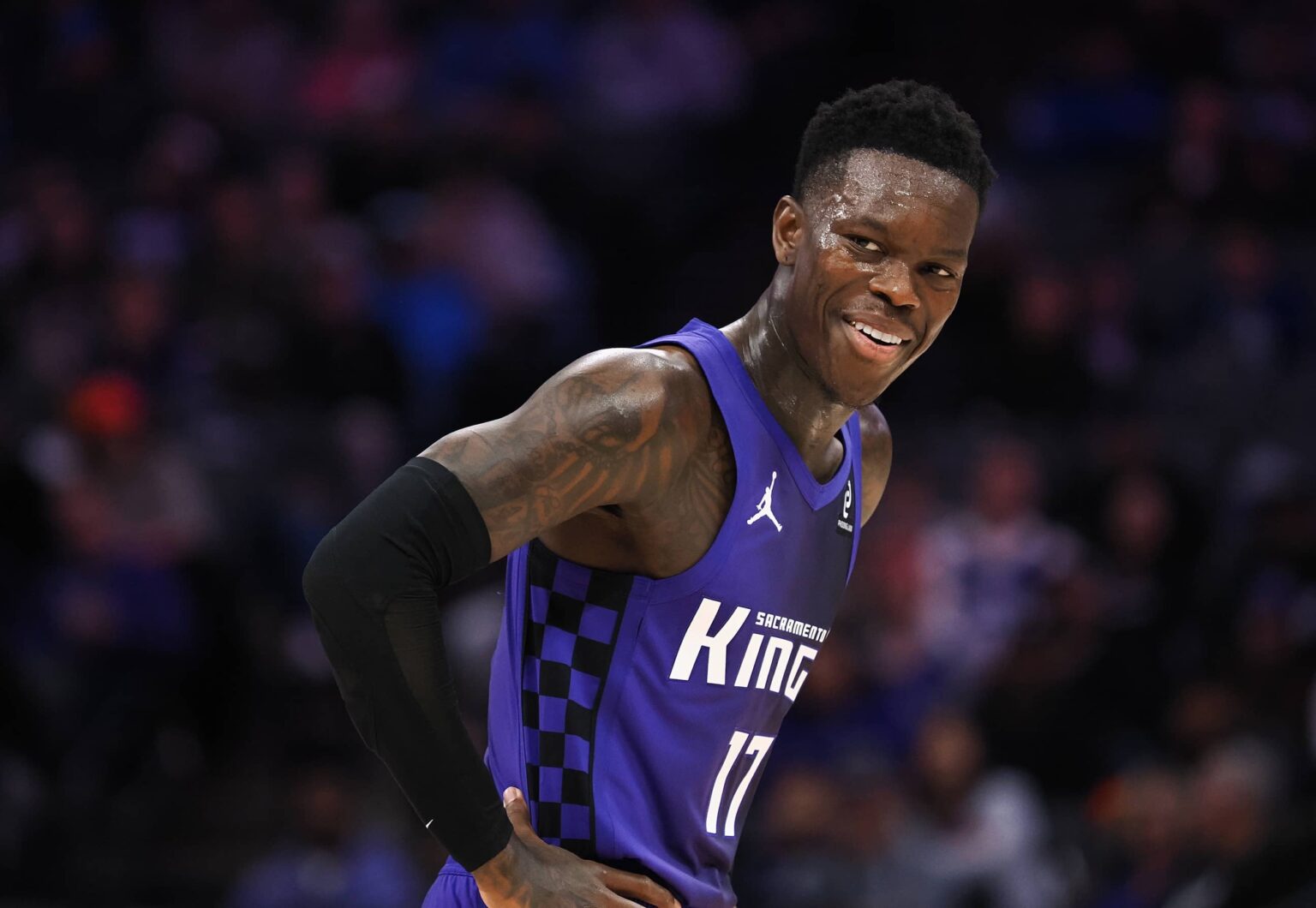 Dec 27, 2025; Sacramento, California, USA; Sacramento Kings guard Dennis Schroder (17) smiles between plays against the Dallas Mavericks during the fourth quarter at Golden 1 Center. Mandatory Credit: Kelley L Cox-Imagn Images