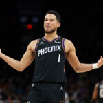 Jan 4, 2026; Phoenix, Arizona, USA; Phoenix Suns guard Devin Booker (1) reacts against the Oklahoma City Thunder in the first half at Mortgage Matchup Center. Mandatory Credit: Mark J. Rebilas-Imagn Images