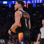 Jan 17, 2026; New York, New York, USA; Phoenix Suns guard Devin Booker (1) sets the play during the second half against the New York Knicks at Madison Square Garden. Mandatory Credit: John Jones-Imagn Images