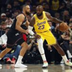 Dec 23, 2025; Phoenix, Arizona, USA; Los Angeles Lakers forward LeBron James (23) against Phoenix Suns forward Dillon Brooks (3) at Mortgage Matchup Center. Mandatory Credit: Mark J. Rebilas-Imagn Images