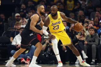 Dec 23, 2025; Phoenix, Arizona, USA; Los Angeles Lakers forward LeBron James (23) against Phoenix Suns forward Dillon Brooks (3) at Mortgage Matchup Center. Mandatory Credit: Mark J. Rebilas-Imagn Images