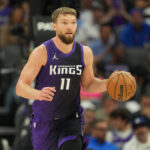 Apr 11, 2025; Sacramento, California, USA; Sacramento Kings forward Domantas Sabonis (11) dribbles against the Los Angeles Clippers during the second quarter at Golden 1 Center. Mandatory Credit: Darren Yamashita-Imagn Images