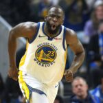 Golden State Warriors forward Draymond Green (23) reacts after making a three point basket against the Dallas Mavericks during the second quarter at Chase Center.