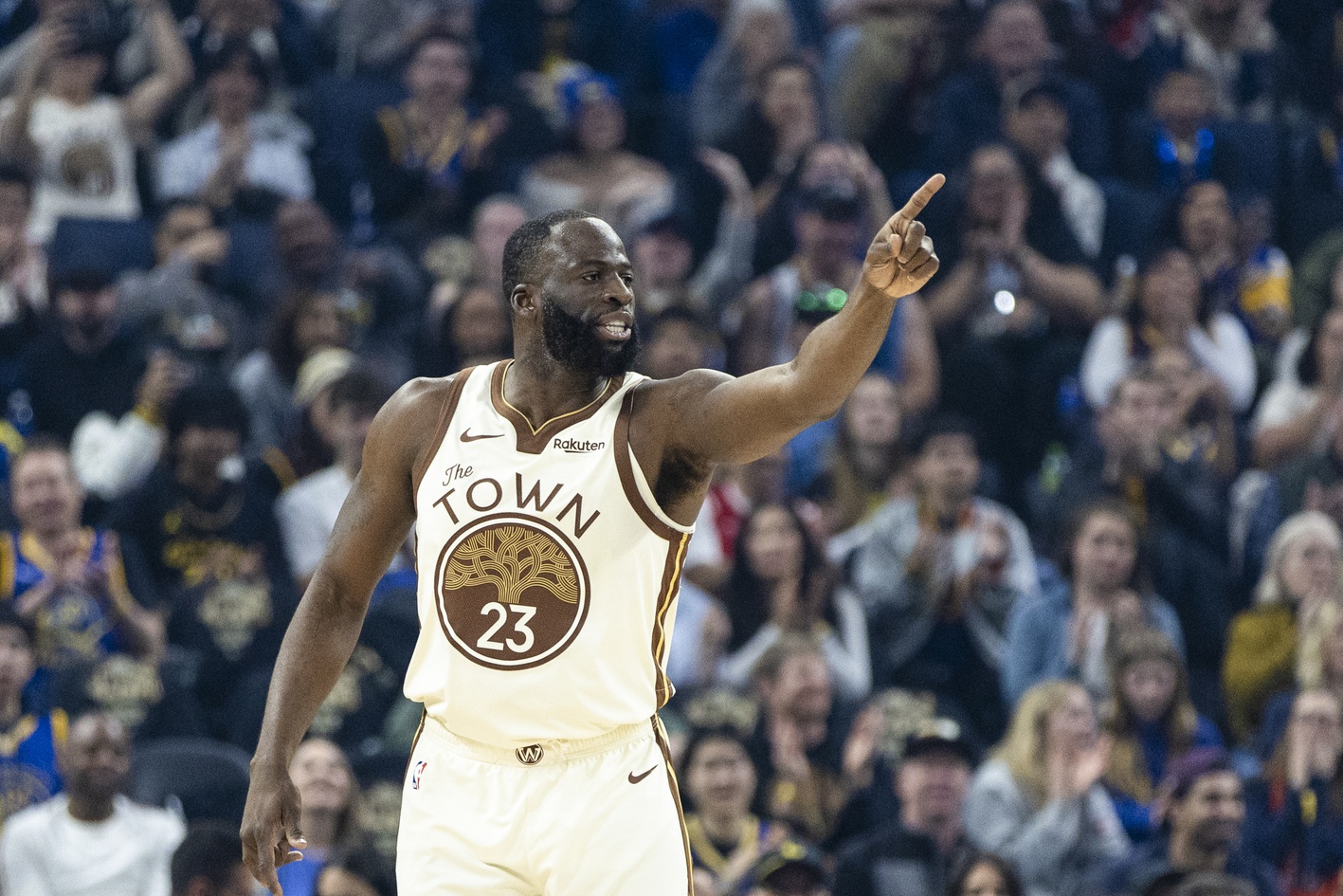 Jan 17, 2026; San Francisco, California, USA; Golden State Warriors forward Draymond Green (23) reacts after hitting a three-point shot against the Charlotte Hornets during the first quarter at Chase Center. Mandatory Credit: John Hefti-Imagn Images