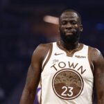 Jan 9, 2026; San Francisco, California, USA; Golden State Warriors forward Draymond Green (23) between plays during the first quarter against the Sacramento Kings at Chase Center. Mandatory Credit: Kelley L Cox-Imagn Images