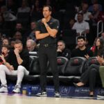Jan 4, 2026; Miami, Florida, USA; Miami Heat head coach Erik Spoelstra keeps his eyes on his team during the first half at Kaseya Center against the New Orleans Pelicans. Mandatory Credit: Jim Rassol-Imagn Images