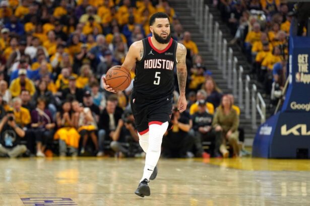 Apr 26, 2025; San Francisco, California, USA; Houston Rockets guard Fred VanVleet (5) dribbles against the Golden State Warriors during the fourth quarter of game three of first round for the 2024 NBA Playoffs at Chase Center. Mandatory Credit: Darren Yamashita-Imagn Images