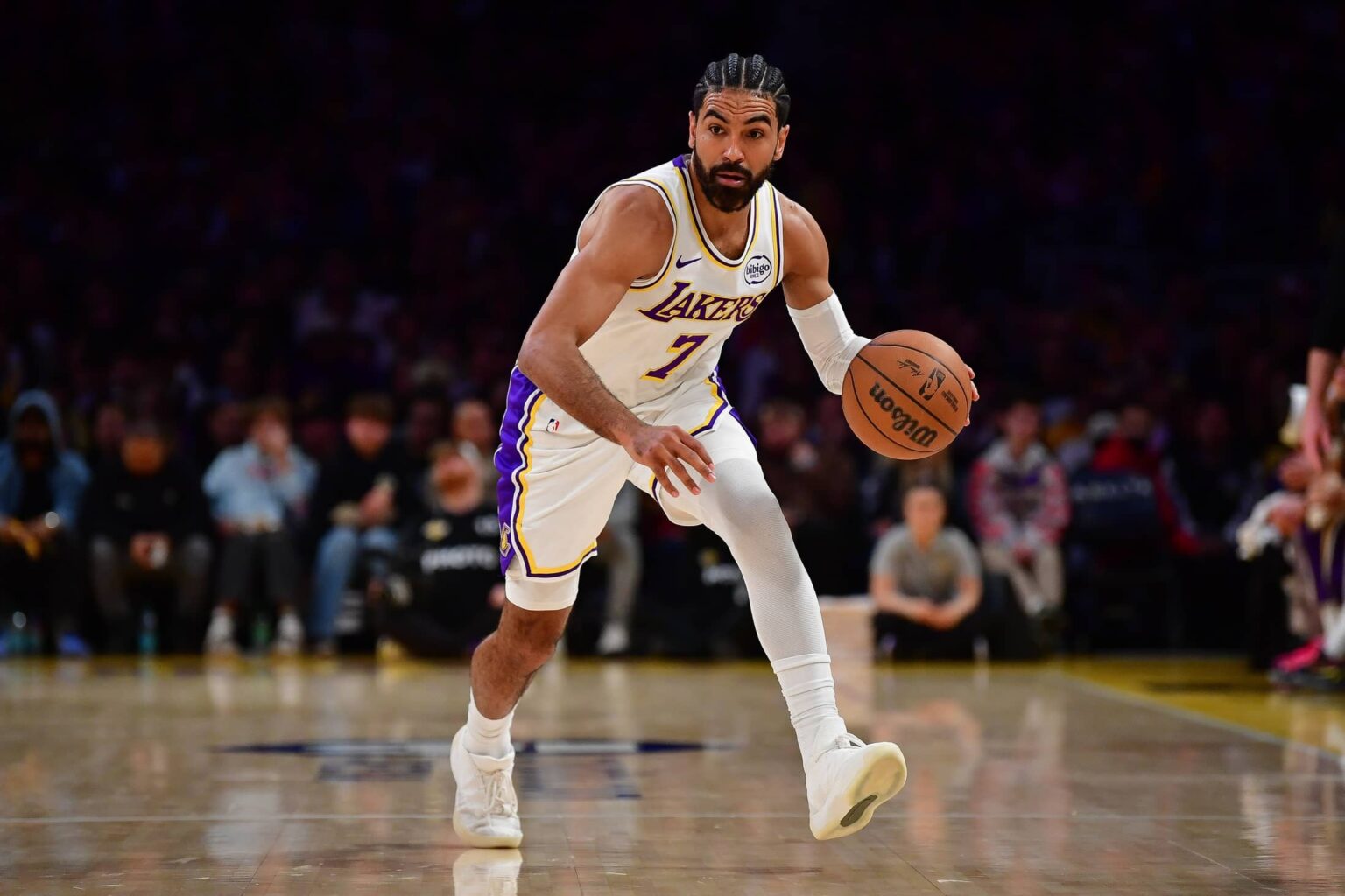 Los Angeles Lakers guard Gabe Vincent (7) controls the ball against the Toronto Raptors during the first half at Crypto.com Arena.